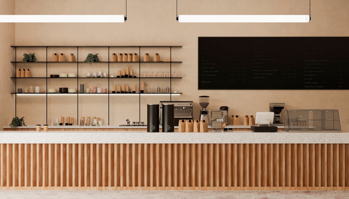 Modern coffee shop interior with counter, shelves and menu board